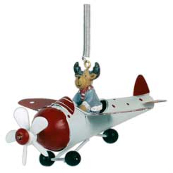 Schwingfigur Elch im Flugzeug